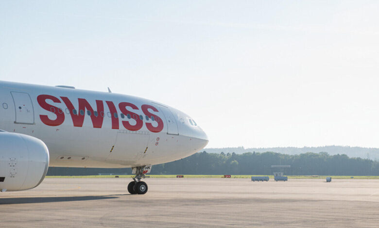 Passengers evacuating aircraft after engine fire on Delhi Zurich flight at Indira Gandhi International Airport with emergency teams responding quickly to the incident