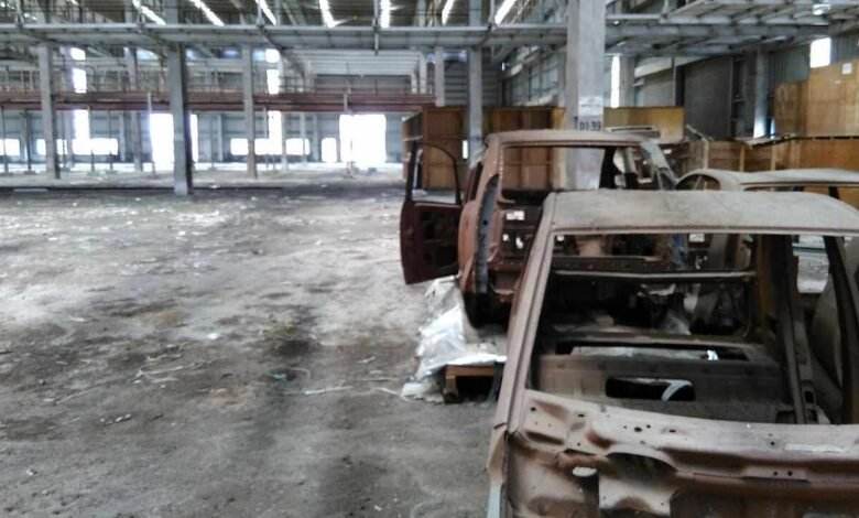 Abandoned Tata Motors Nano factory land in Singur showing damaged farmland and unused industrial site