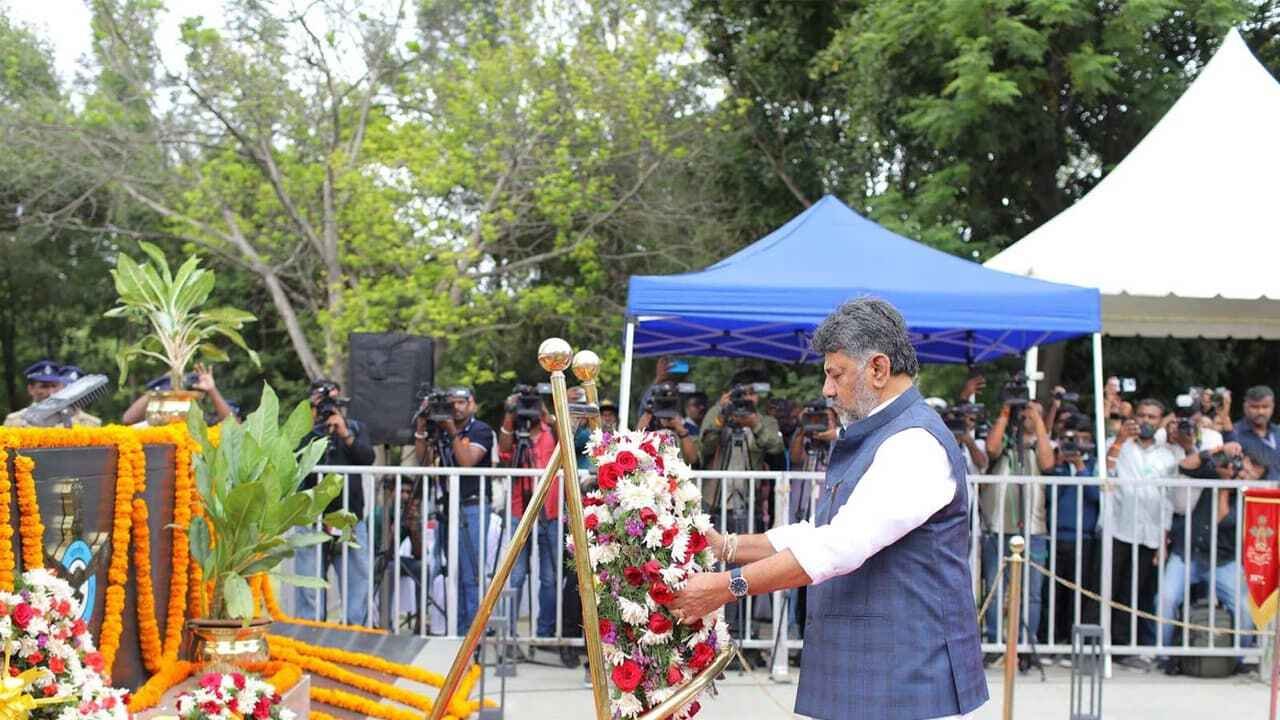 DK Shivakumar Pays Tribute on Kargil Vijay Diwas Comments on Dharmendra Pradhan Resignation