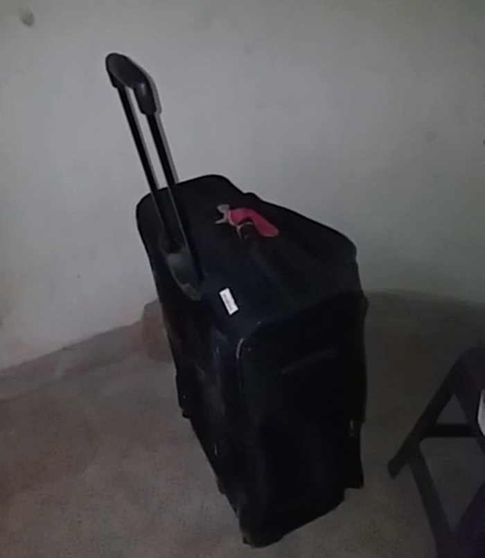 Student used suitcase to carry a outsider to his room