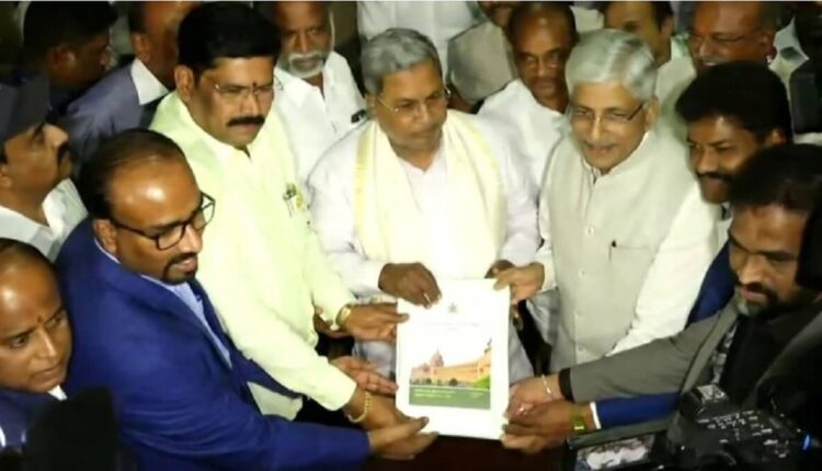 Karnataka CM Siddaramaiah received the caste census report from Jayaprakash Hegde