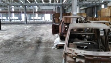 Abandoned Tata Motors Nano factory land in Singur showing damaged farmland and unused industrial site